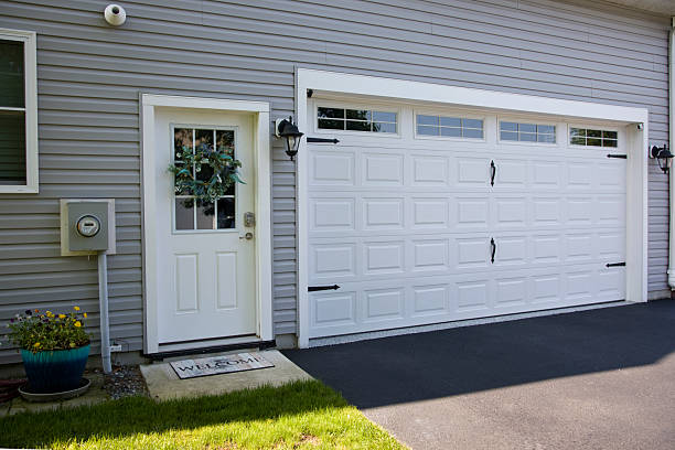 24/7 Emergency Garage Door Panel Replacement experts in Adrian, MO